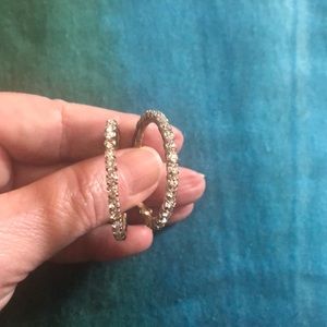 Brass zirconia hoops.